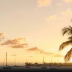 Pôr do sol em Carlisle Bay, Barbados, com veleiros ancorados e coqueiros em primeiro plano